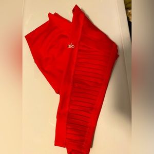 ALO NEON ORANGE LEGGINS. SIZE 6 / MEDIUM.